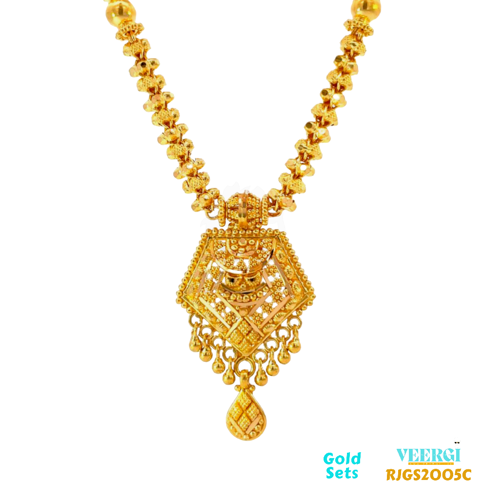 The 22kt gold chain set features a top half chain that consists of gold balls and a bottom half chain that is attached to a pendant. The bottom half chain goes through a gold ring, which adds an interesting design element to the piece. Weight: 24.10gm Length of Necklace and Earring 21.50/3.50cm